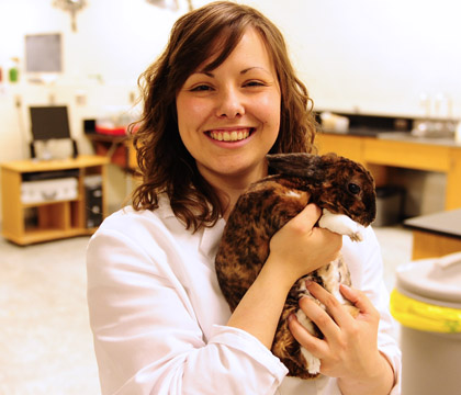 Fourth-year veterinary student Vanessa Tonn and a pet rabbit. Photo: Debra Marshall.