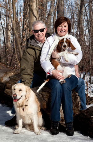 Jim Dobie and Terri Schindel with their two dogs, Parker (left) and Banjo (centre). Photo: Jeff Entwistle.