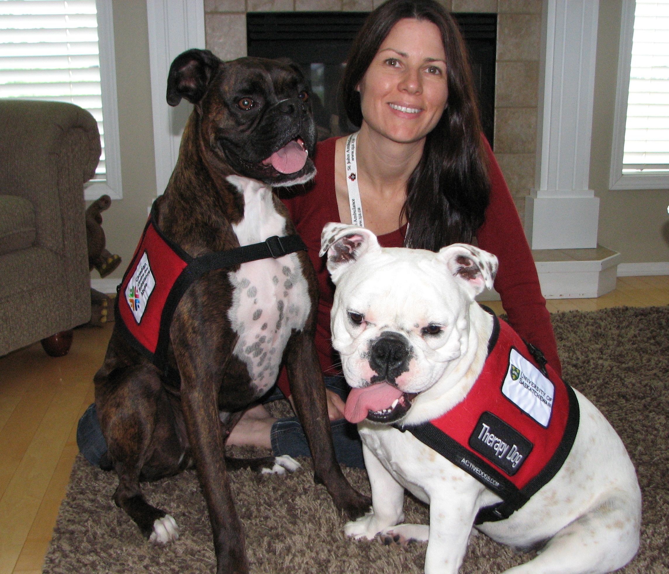 Colleen Dell with Subie (left) and Anna-Belle (right), her two St. John's Ambulance certified therapy dogs. Photo: David Batstone.