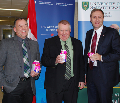 Left to right: Dr. John Campbell, WCVM; Mel Foth of SaskMilk and MP Brad Trost (Saskatoon-Humboldt).