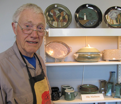 Dr. Ole Nielsen with some of his handmade pottery. Photo courtesy of Dr. Nielsen.