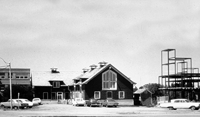 The Veterinary Hygiene Building (centre) was the temporary home for WCVM's clinical services from 1964-68. To the right is the new college's steel structure. 