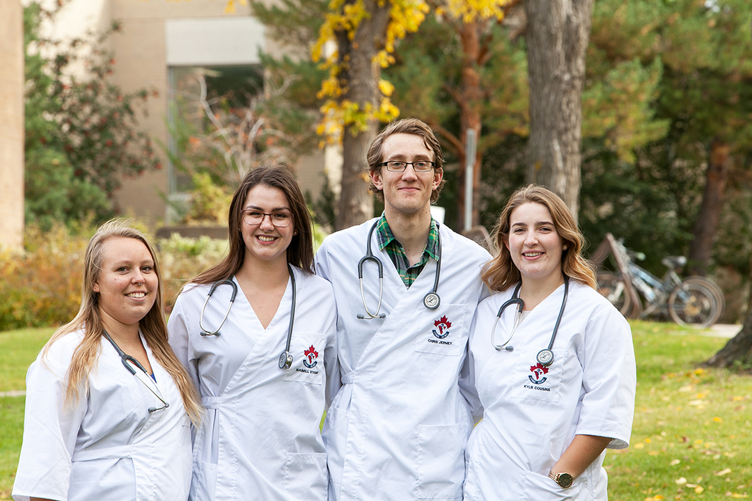 First-year veterinary student Christopher Jermey and three of his classmates (l to r): Oliva Rad, Isabell Stamm and Kylie Cousins. Photo: Christina Weese.