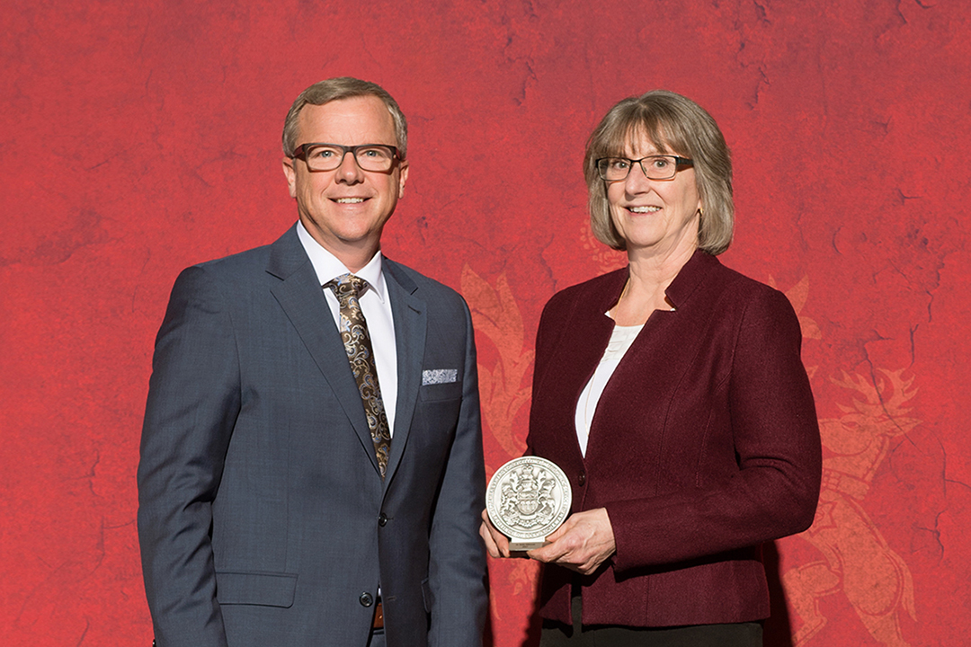 Dr. Betty Althouse and former Premier Brad Wall during the ceremony for the Saskatchewan Premier’s Award for Excellence in Public Service. Photo: Government of Saskatchewan.
