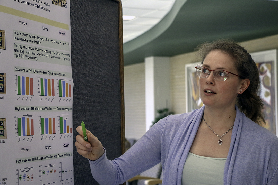 Ivanna Kozii discusses her honey bee research. Photo by WCVM Today. 