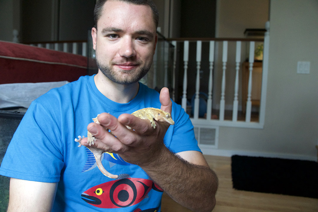 John Makaryshyn displays one of his reptile pets. Photo: Dr. Gwen Roy. 