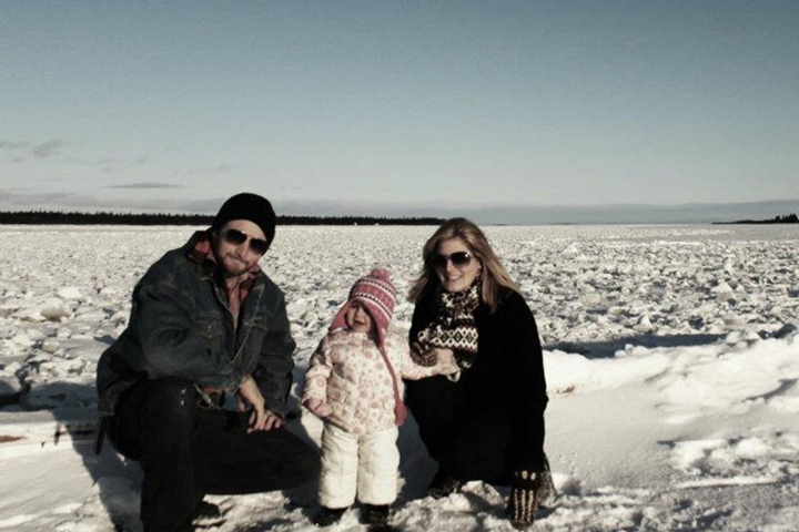 Charlie Swain and her fiancé with daughter Lucy on the ice in northern Labrador. Supplied photo. 