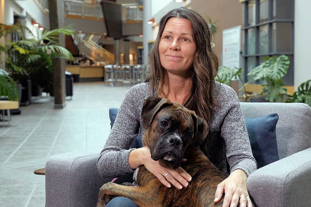 Dr. Colleen Dell, a professor of sociology in the USask College of Arts and Science and the university’s Research Chair in One Health and Wellness, and E-Jay (her companion animal; service and therapy dog in training). (Photo: Screengrab)