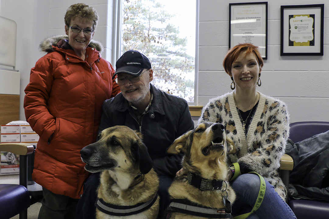 Bruce's family includes Connie, Dennis and their daughter Jennifer, along with Bruce (right) and their second dog Karm (left). Photo: Jeanette Neufeld.