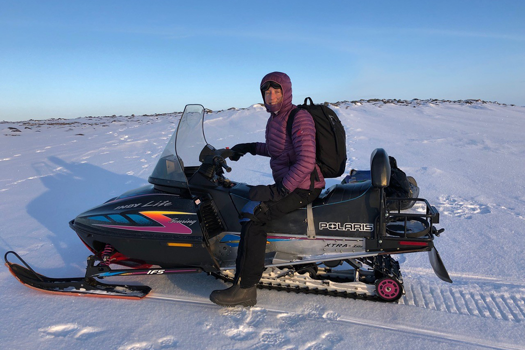 Dr. Emily Jenkins on one of the research team's snowmobiles at Karrak Lake, Nunavut. Supplied photo. 