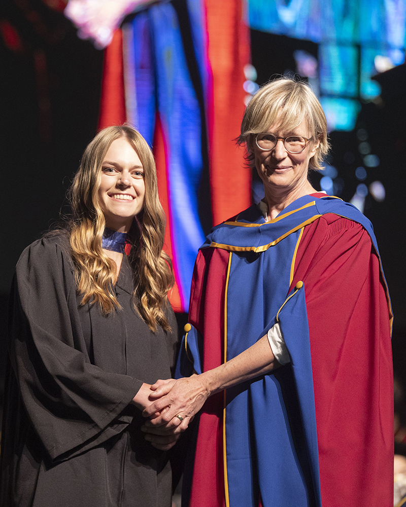 Dr. Megan Russnak (left) receives the 2022 WCVM Gold Medal Award from WCVM Dean Dr. Gillian Muir. Photo by David Stobbe.