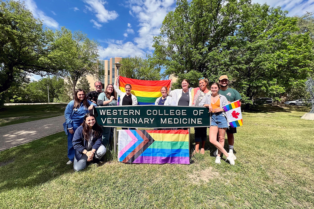Members of the WCVM PRIDE club outside the Western College of Veterinary Medicine.