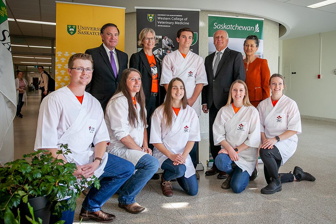Back row, left to right: Saskatchewan Advanced Education Minister Gord Wyant, WCVM Dean Gillian Muir, second-year WCVM student Jackson Goudy, Saskatchewan Agriculture Minister David Marit and USask Provost Dr. Airini. Front row, left to right: first-year student Gavin Fleck, fourth-year students Michelle Streeter and Alisha Triff, and third-year veterinary student Maya Kliewer. Photo: Christina Weese. 