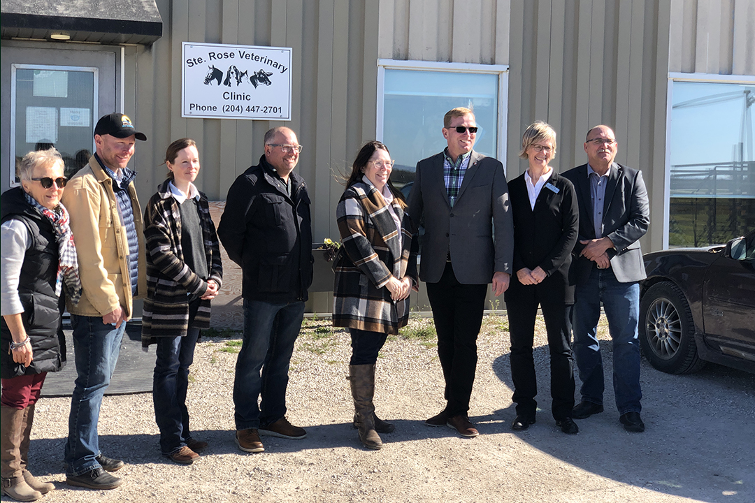 Left to right: Dori Gingera-Beauchemin, Manitoba's deputy minister of agriculture; Tyler Fulton, president, Manitoba Beef Producers; Dr. Deanne Wilkinson (DVM'12), extension veterinarian, Manitoba Ministry of Agriculture and WCVM graduate; Robert Brunel, mayor, Municipality of Ste. Rose; Jill Verwey, vice-president, Keystone Agricultural Producers; the Honourable Derek Johnston, Manitoba's minister of agriculture, Dr. Gillian Muir, WCVM dean; and Brad Michaleski, MLA of Dauphin, Man. Photo: Dr. Steve Manning. 