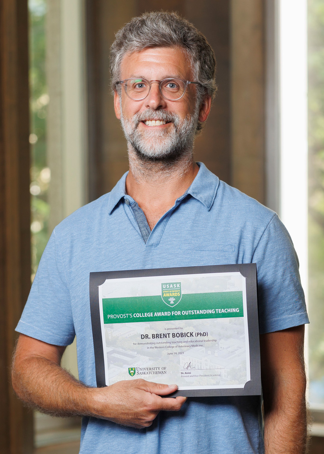 Dr. Bobick received his award at the USask Staff and Faculty Awards ceremony on June 14. Photo: Dave Stobbe.