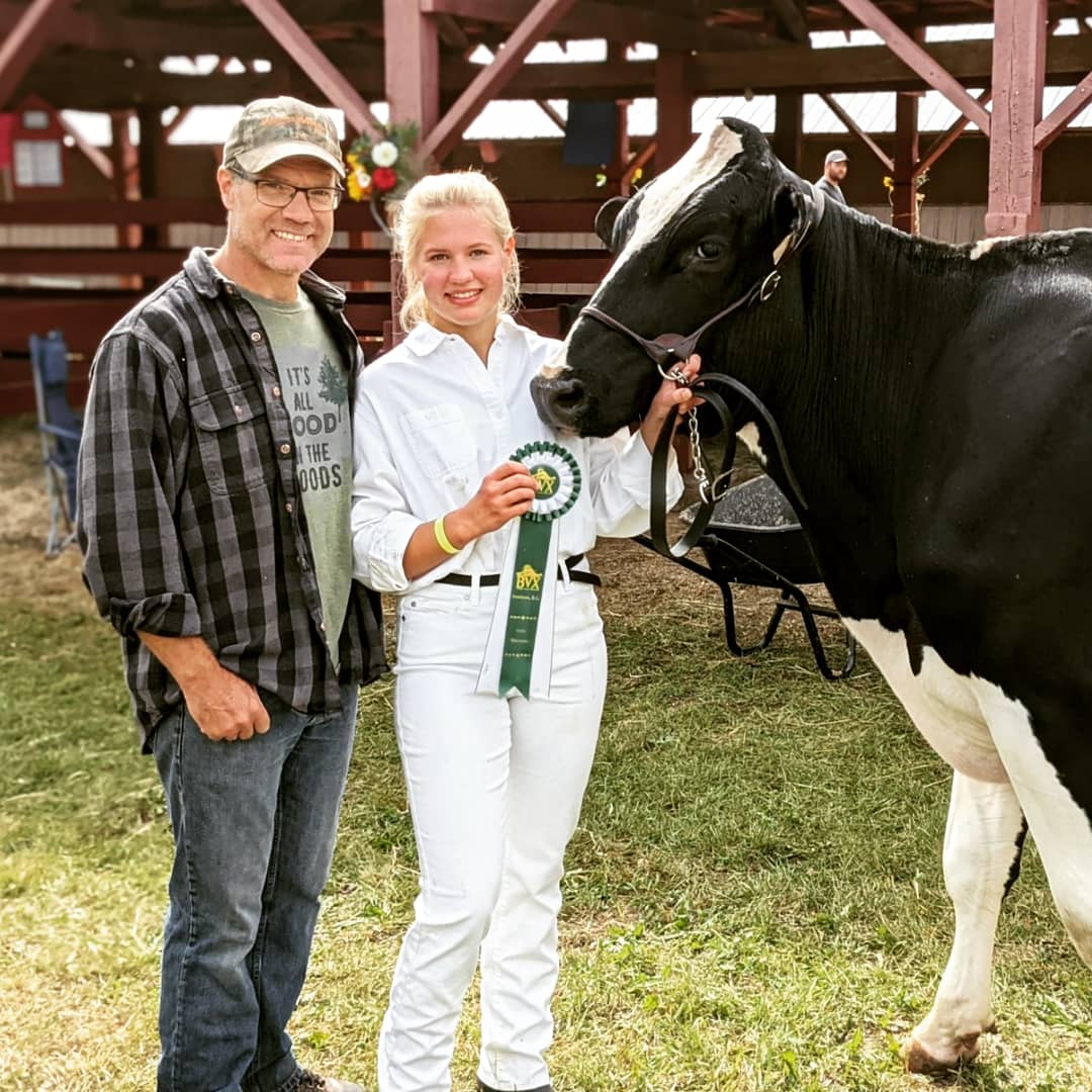 Abigail Cunningham spent several years working as a milker on a local dairy farm, training some of the herd’s best cows for public milking demonstrations. Supplied photo. 