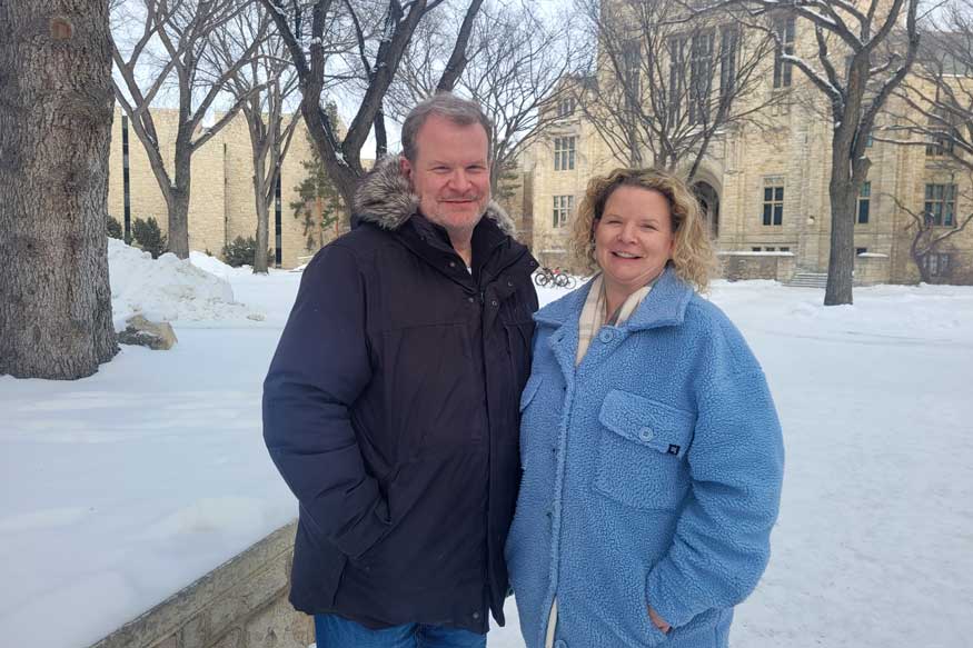 Tyler Moss and Tannis Nicholson stand together on the USask campus.