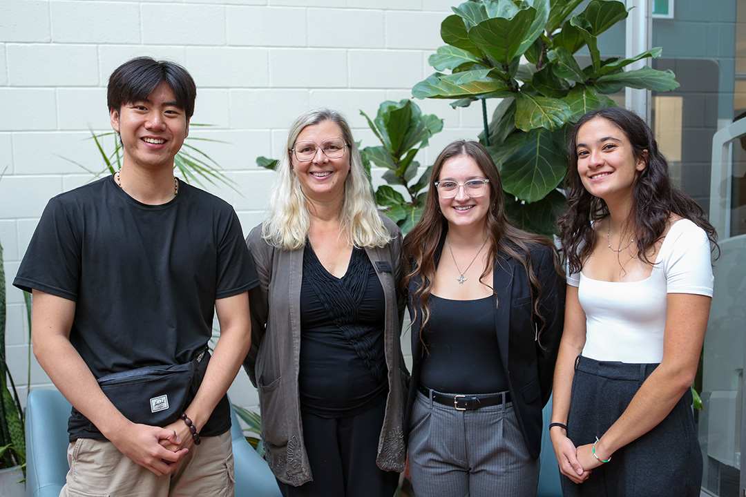 From left to right: Jason Fu, WCVM associate dean Dr. Lynn Weber, Saylor Martin and Maria Janser. Photo: Tyler Schroeder. 