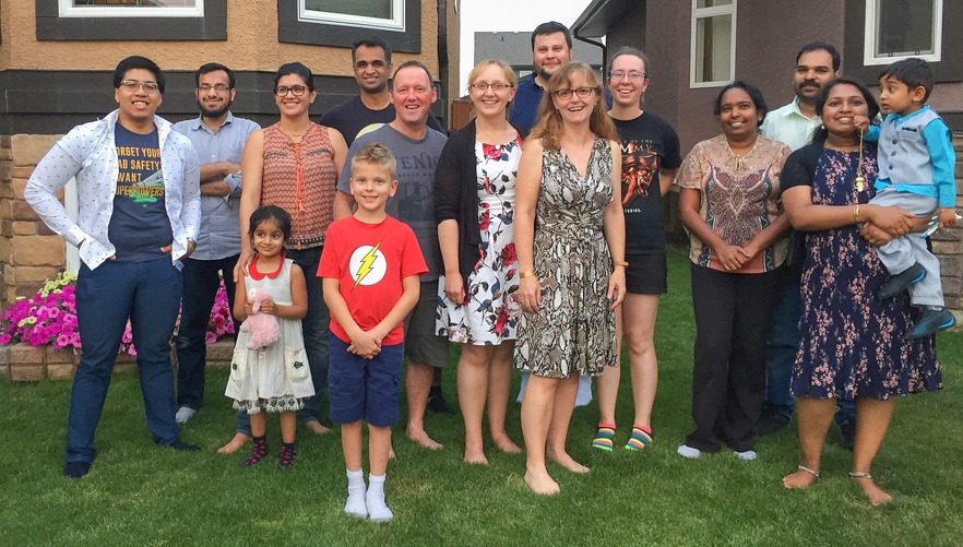 Pictured: Dr. Hill hosts a reunion with past members of the Hill Lab.