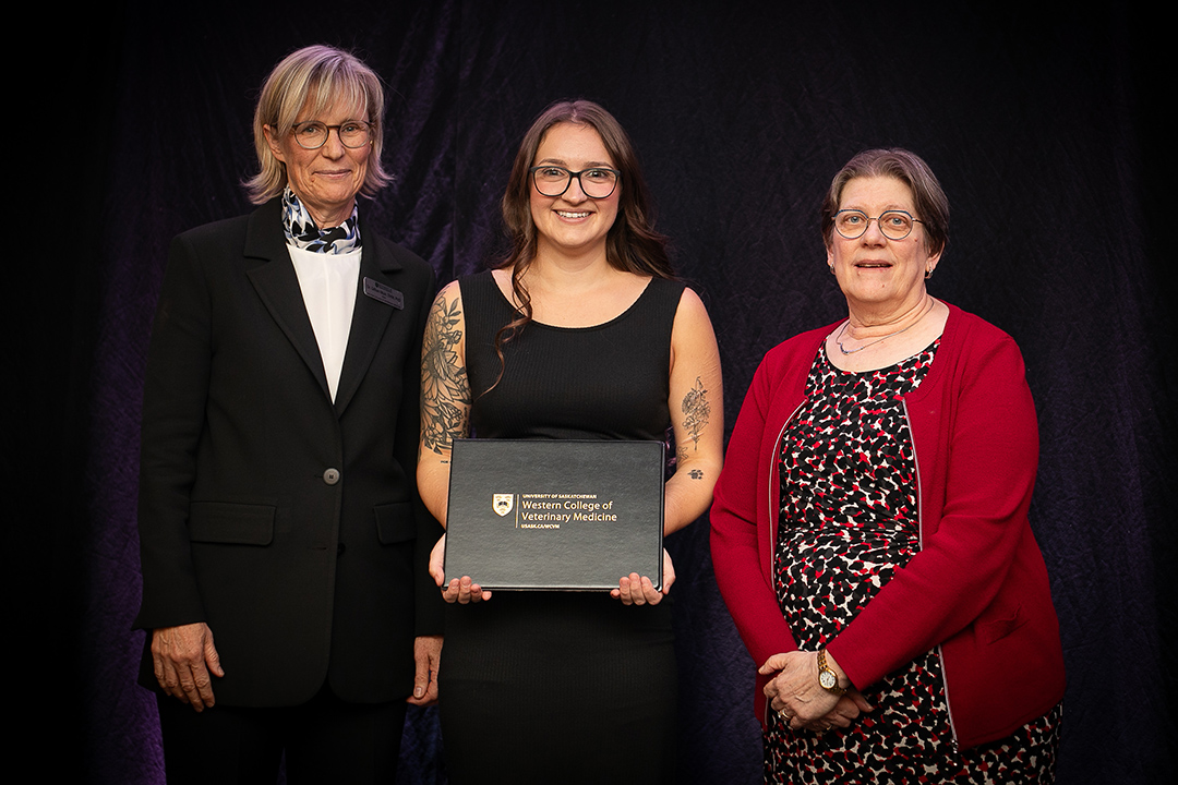 Award presentation photo. Left to right: Dr. Gillian Muir, Saylor Martian, Dr. Pat Blakley.