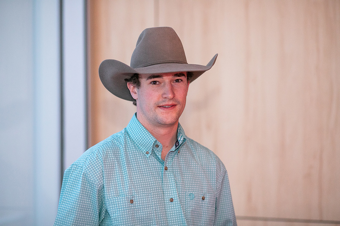 Dr. Quin Bateman flaunts a cowboy hat at the WCVM graduation banquet.